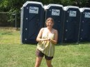 No, we did not meet at the Porta-Potties. Just at the free music festival. Close enough.
